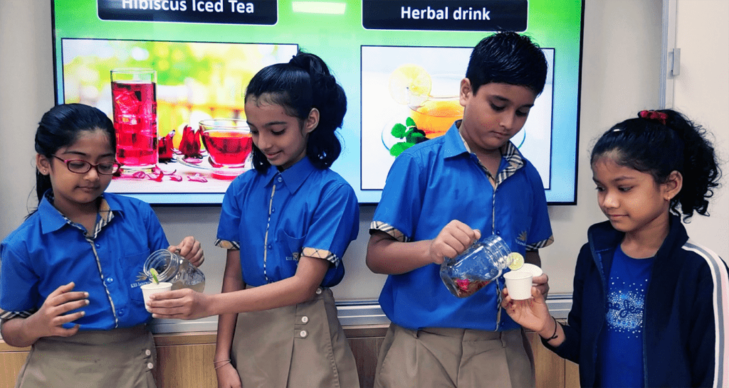 Students of kes International School Drinking herbal tea